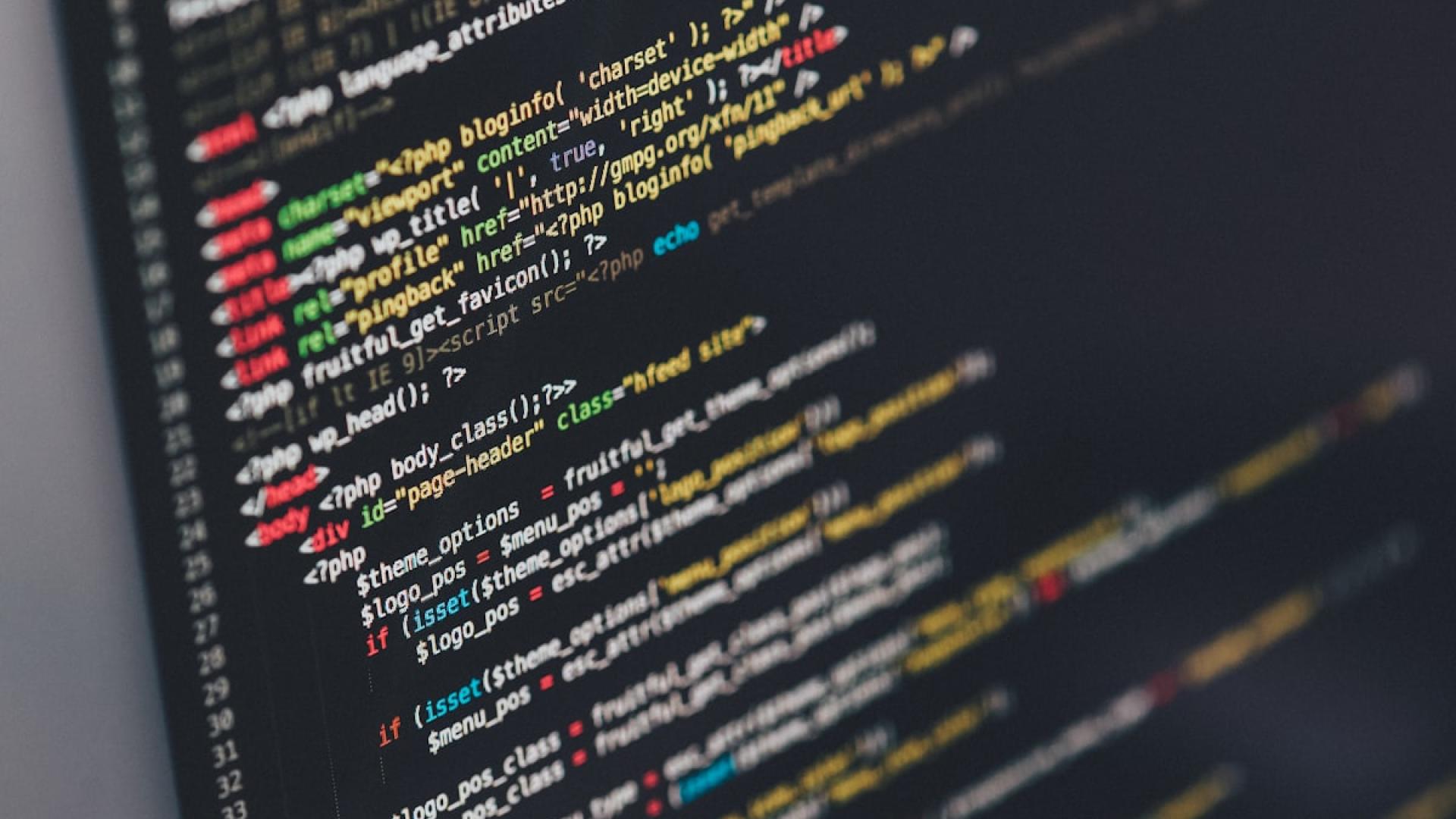 Source code displayed on a dark monitor